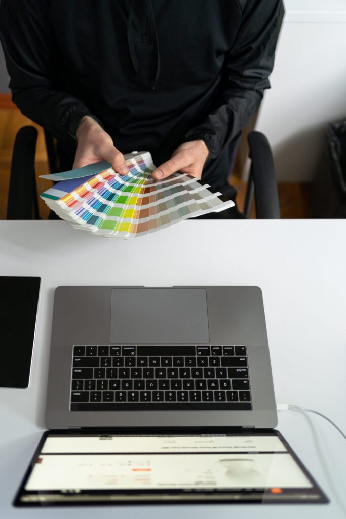 a man working with a color pallet in the office