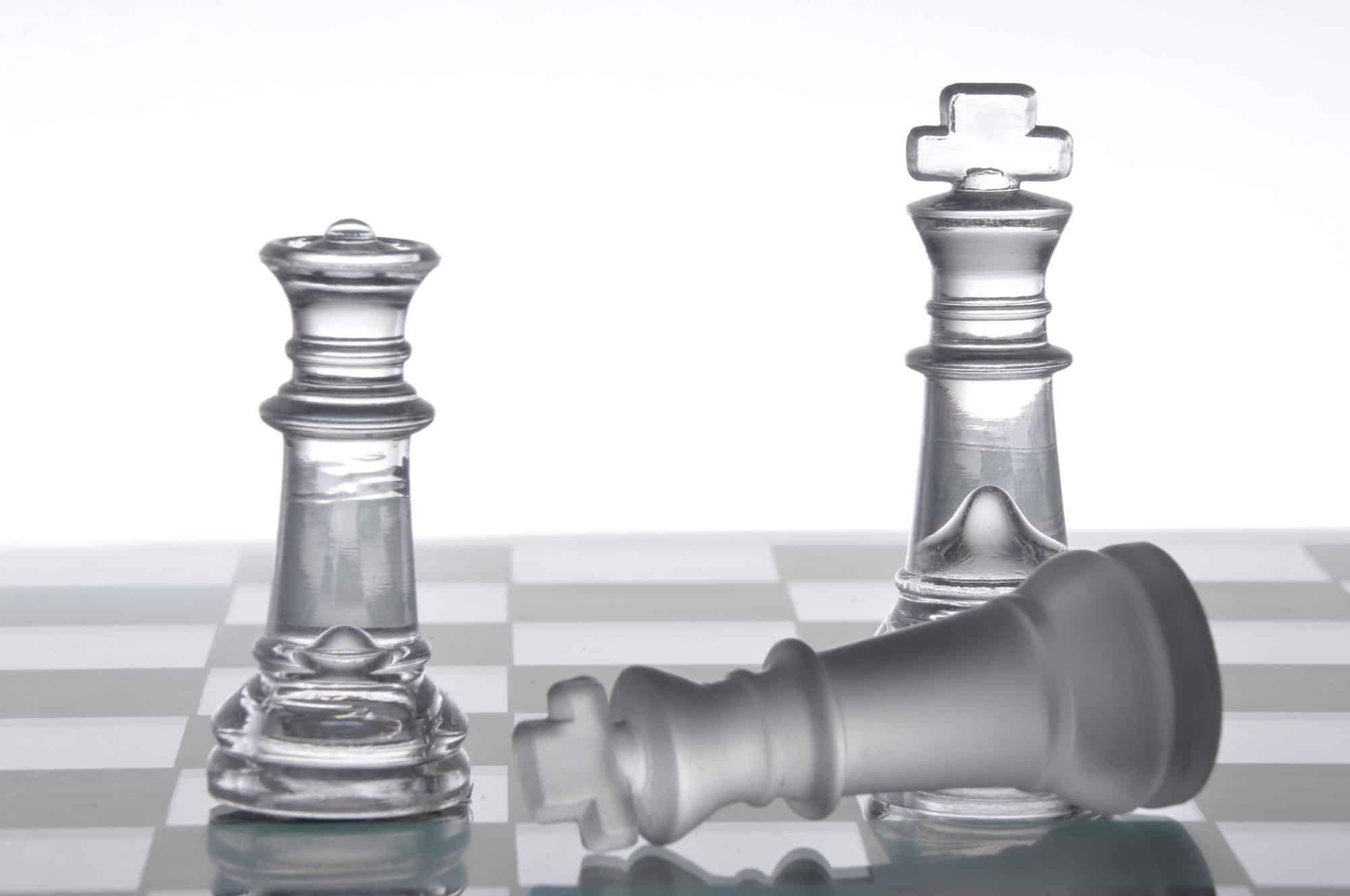 chess pieces advancing their position to victory