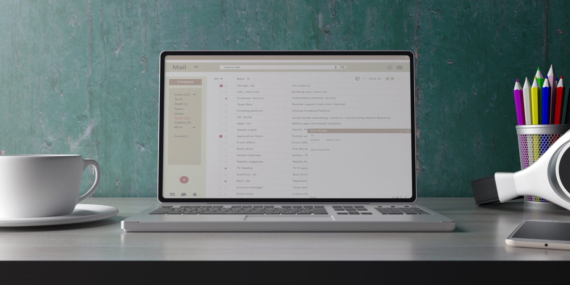 laptop computer with emails list on screen